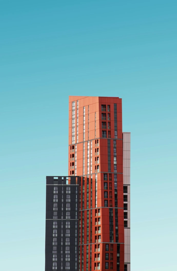 orange and black high rise building